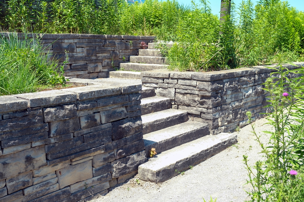 luxury,landscaping,with,natural,stone,retaining,wall,and,coping,,wide